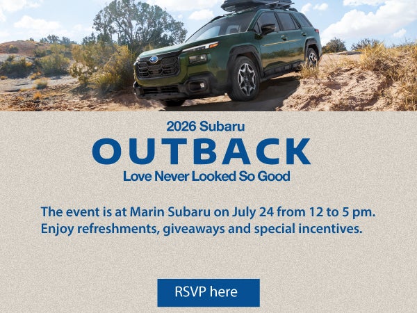 Subaru Outback driving on rugged terrain