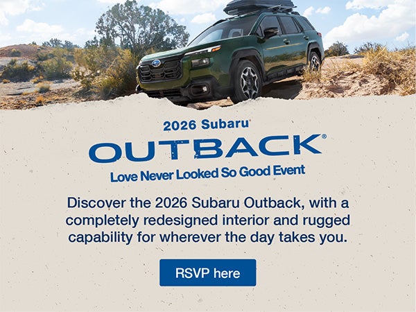 Subaru Outback driving on rugged terrain